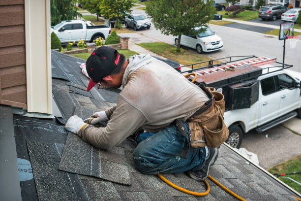 Professional Roofing technician working in Rosburg, WA
